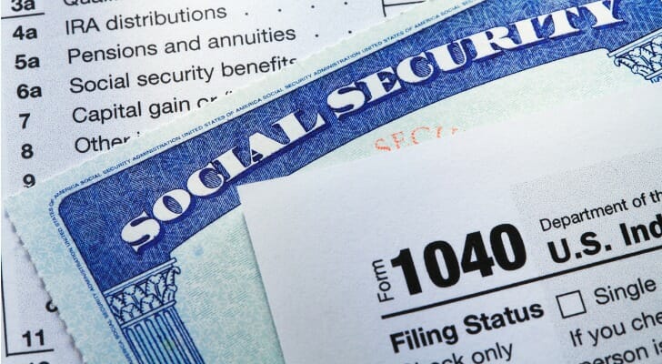 Closeup of a Social Security card and IRS Form 1040.