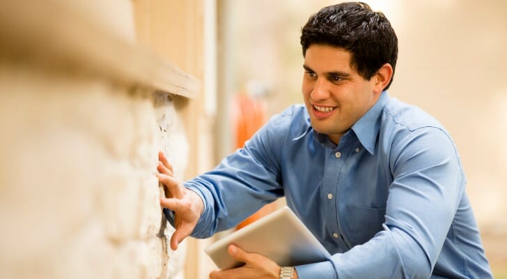 Home inspector appraising home