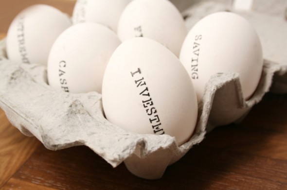 Half a carton of eggs with general retirement planning moves printed on them.