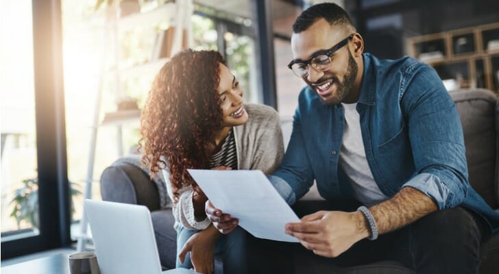 Couple making tax paying plans.