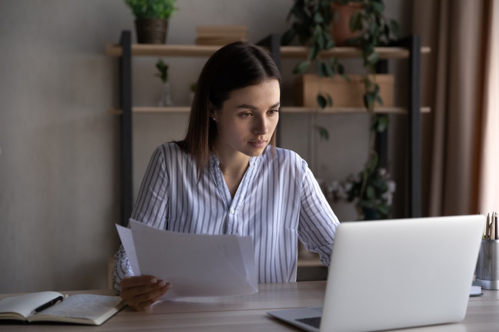 An investor reviewing her investment portfolio.