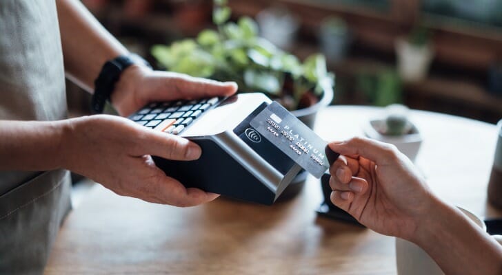 Customer uses a credit card to make a purchase.