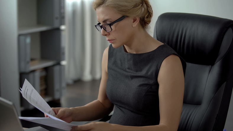 An investor looks up savings bonds rates.