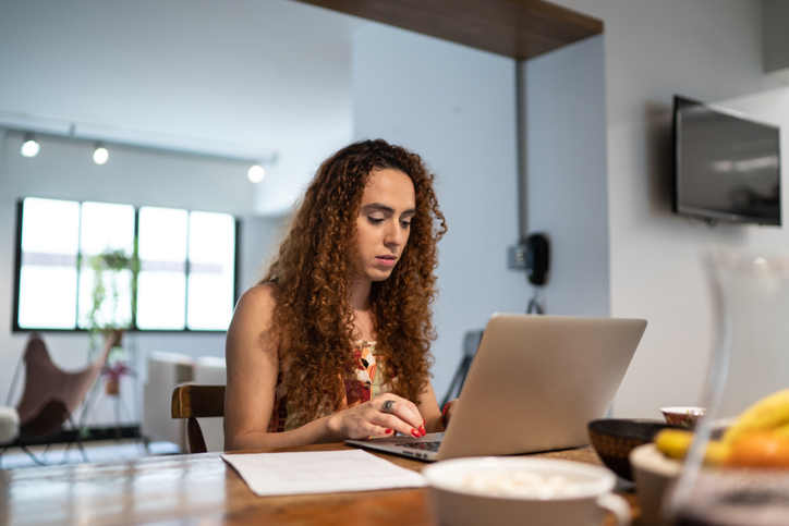 An investor researching the benefits and risks of growth investments.