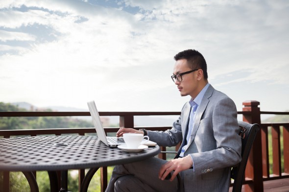 A businessman reviews how to close a checking account.