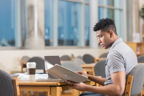 Man reviewing his tax returns.