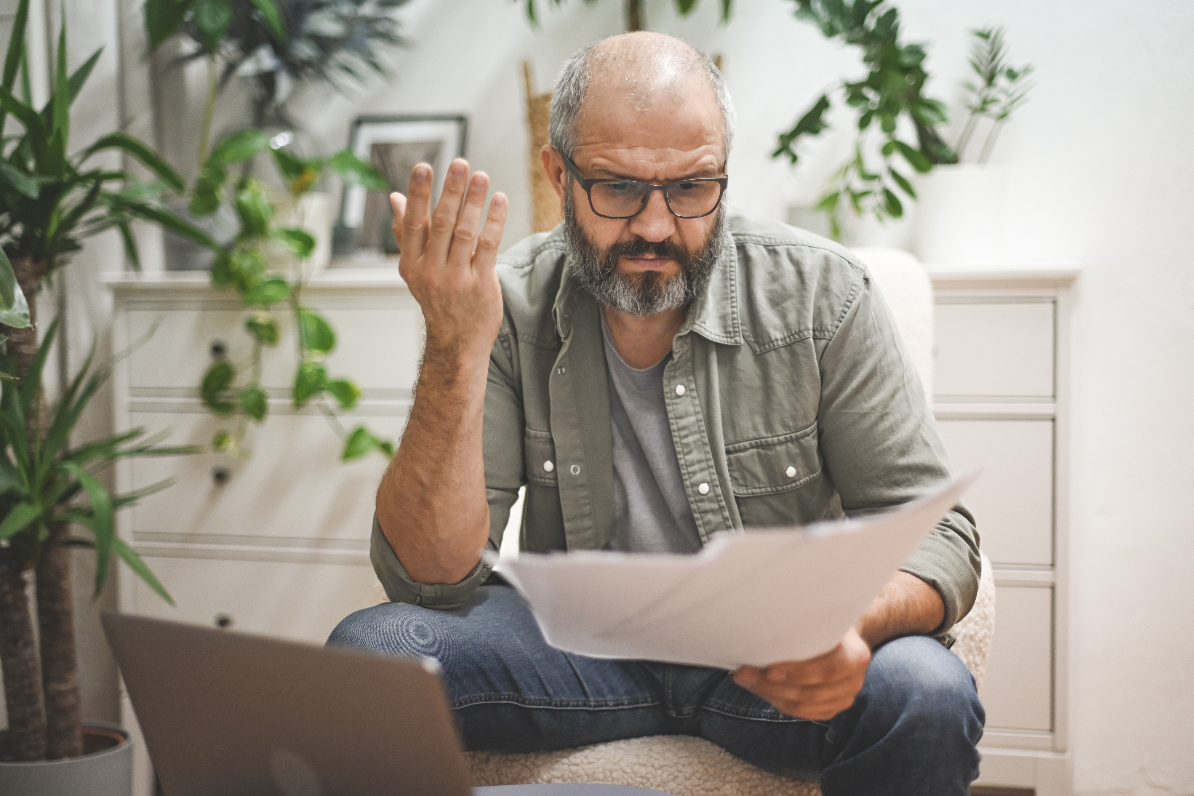 A man reviewing his payroll taxes.
