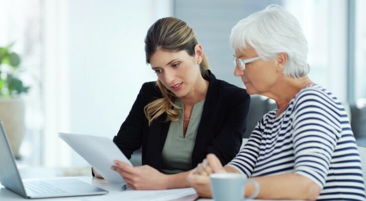 A financial advisor discussing a portfolio with a client.