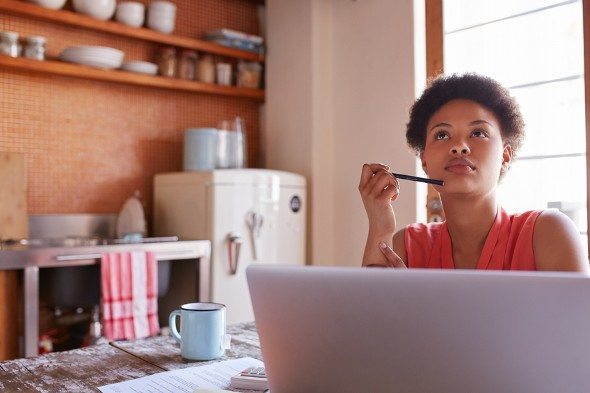 A woman thinking about a contingency plan during a recession.