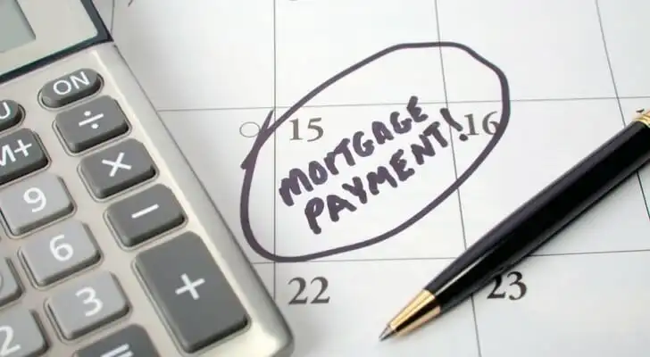 Calendar marked as mid-month for a mortgage due date.