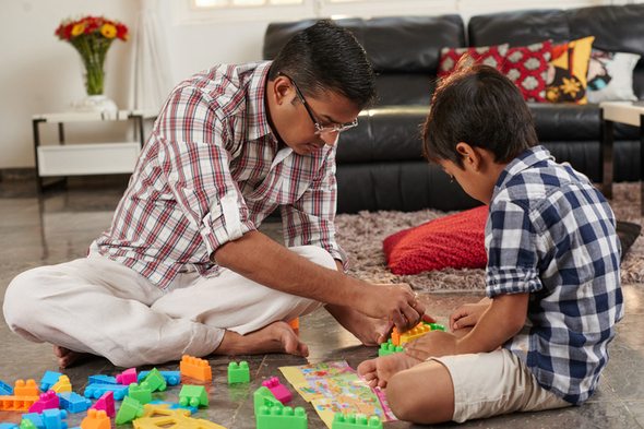 A father with his son, who he plans on claiming as a dependent.