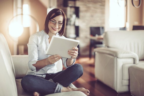 A woman reviewing the bank account she's just opened.
