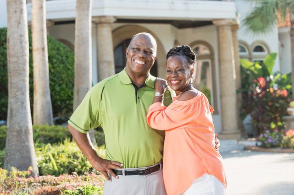 A husband and wife enjoy their golden years, having learned how to retire at 55.