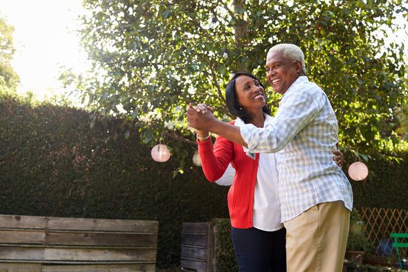 A couple enjoying retirement, having considered annuity pros and cons to choose the right annuity for them.