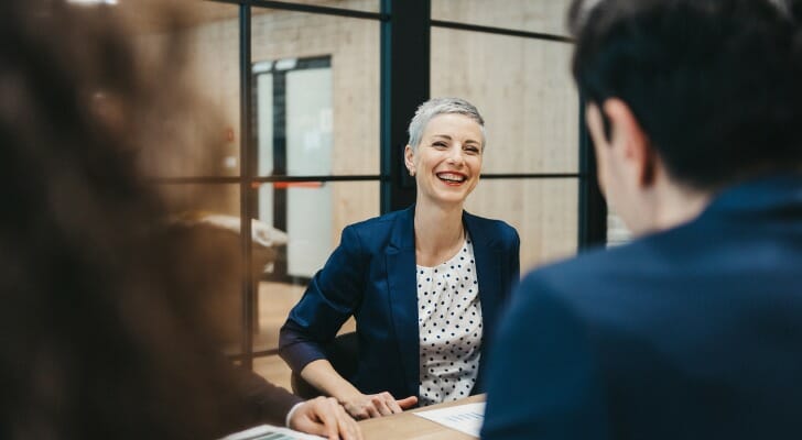 Hire an investment manager when your finances become complex and you need help with strategy, risk and long-term goals.