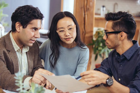 A couple asking their financial advisor about credit unions.