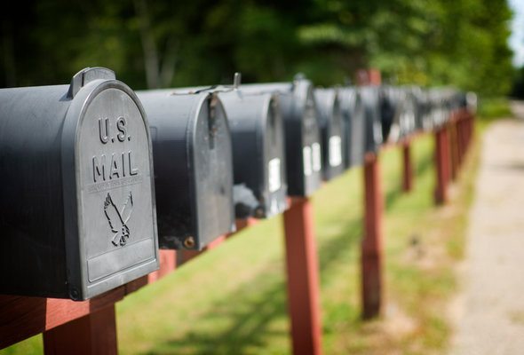 Row of mailboxes representing taxpayers who are still waiting for their tax refund.