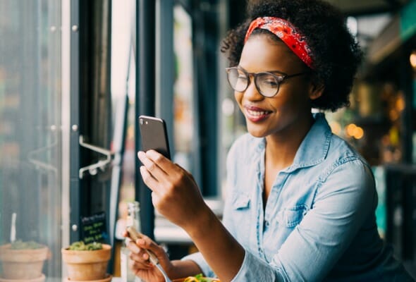 A woman looking at the balance of her retirement account.
