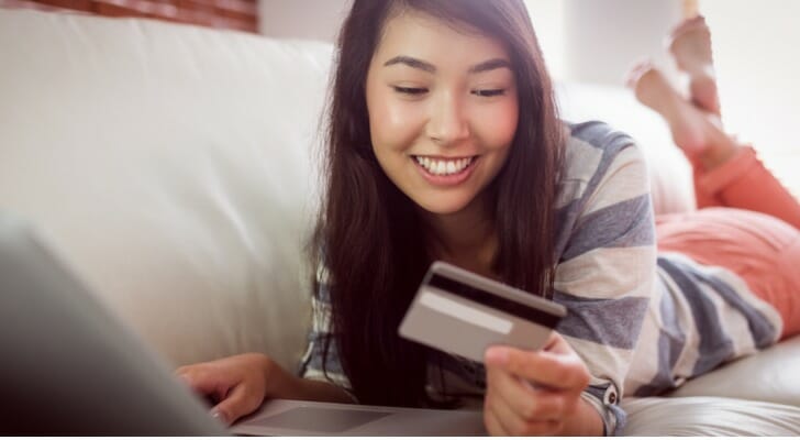 A woman reviewing her bank account online.