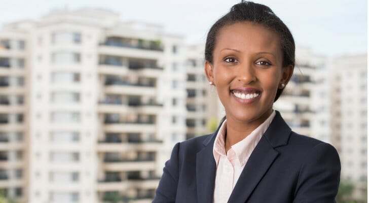 An investment broker in her office.