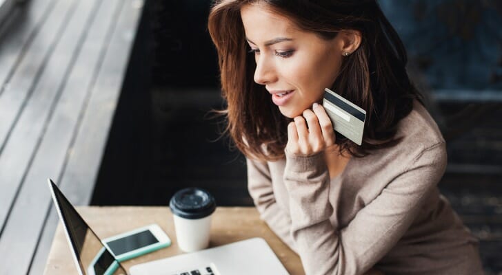 A woman comparing U.S. Bank and Chase accounts.
