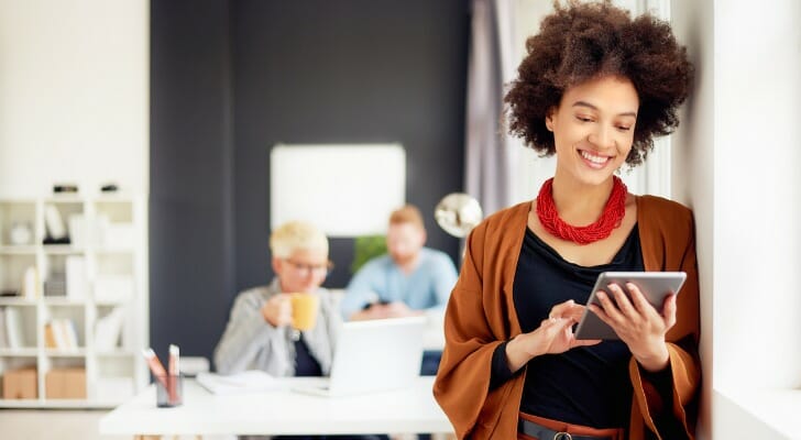 A woman reviewing her bank accounts.