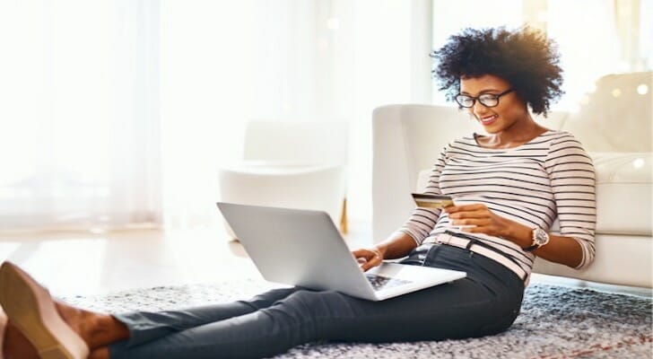 A bank client reviewing her account online.