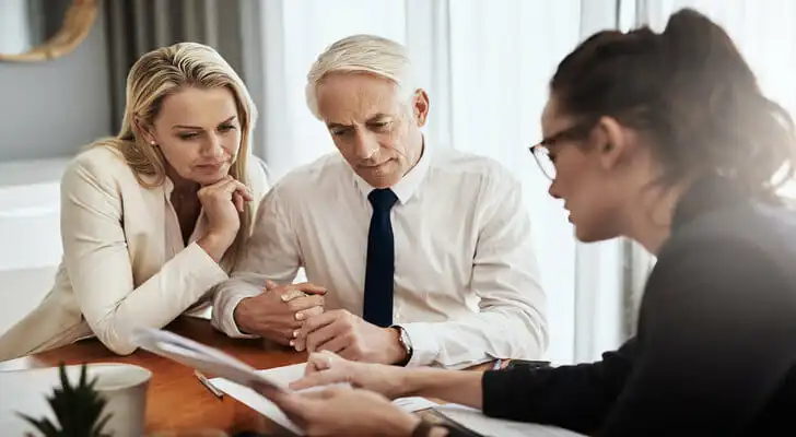 A financial advisor answers a couple's questions.