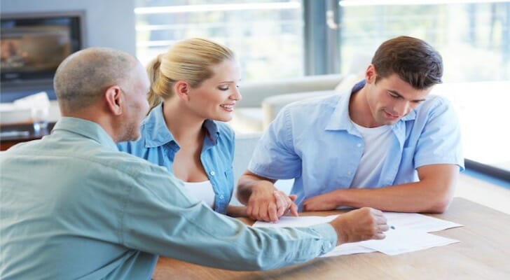 A couple working with their tax consultant.