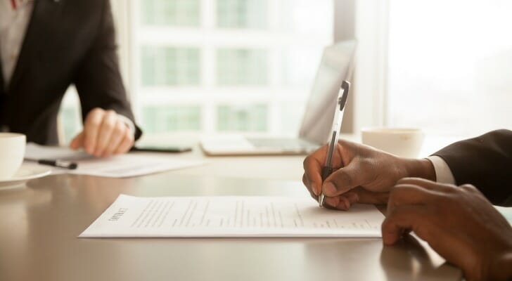 A man closes a bank account.