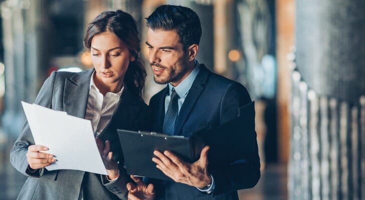 Wealth management advisors discuss strategy.