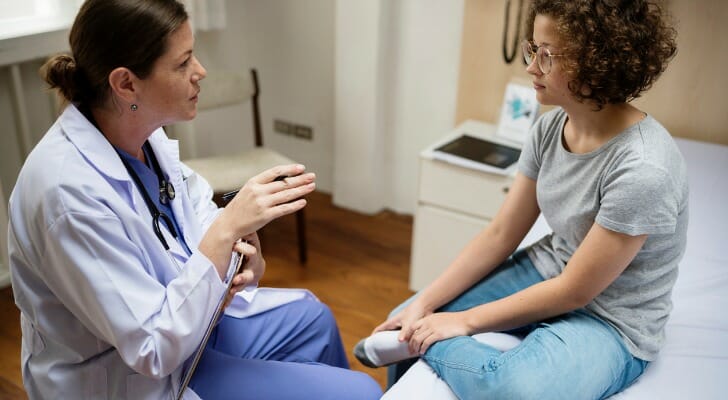 A doctor speaking with a patient.