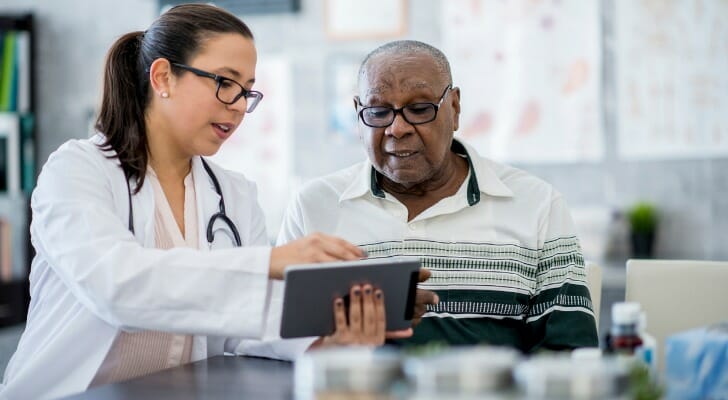 A doctor speaking with a patient.