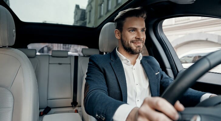 A landlord driving to a rental property.