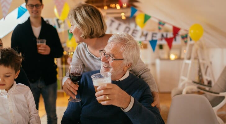 A man enjoying his retirement party.