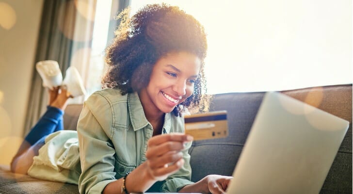 A woman comparing the services from her bank with another one.