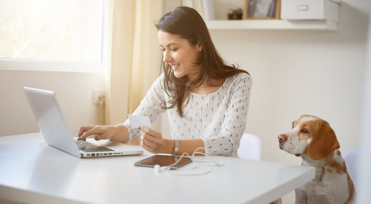 A woman reviews Ally vs Barclays bank.