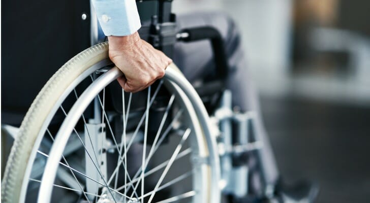 A person sitting in a wheelchair on Social Security Disability Insurance (SSDI).
