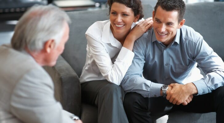 An advisor discusses the Series 7 license with clients.