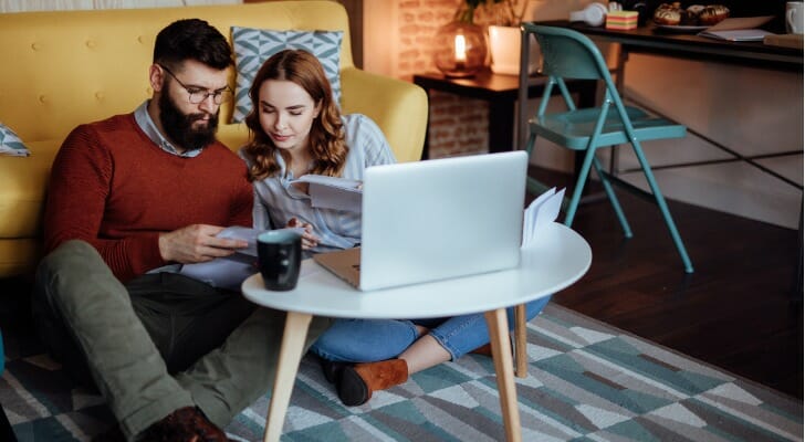A couple use TreasuryDirect to buy government bonds.