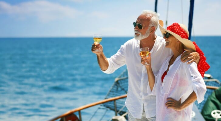 A couple enjoy their retirement on a cruise ship.