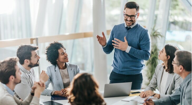 Trust company officials in a meeting.