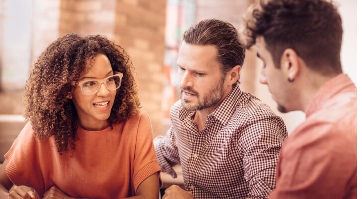 A couple discuss what joint tenancy means for their estate plan with their advisor.