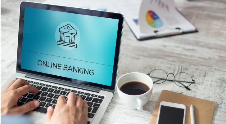 A man getting information about online banking.