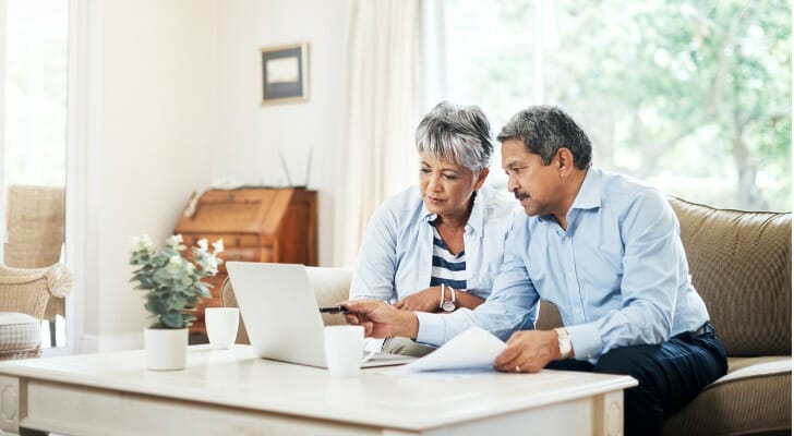 A couple review whether a self-directed Roth IRA is the right choice for them.