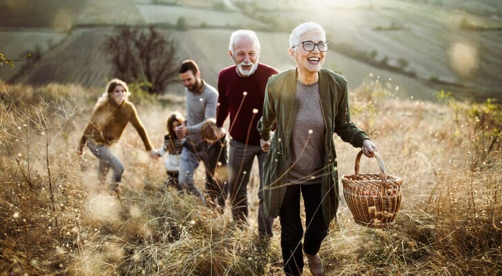 A retired couple enjoying a day with their family, having created a living trust in South Dakota.