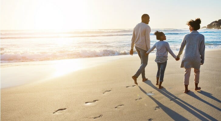 A family walks on the beach, content with having created a living trust in Pennsylvania.