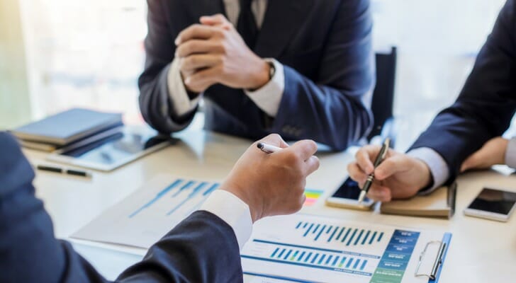 Certified Kingdom Advisors work together on financial planning.