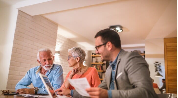 A certified senior adviser meeting with clients.