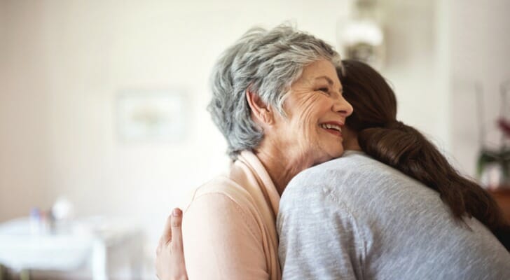 A mother and daughter hug, having created a living trust in Connecticut.